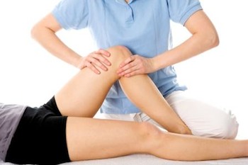 Physiotherapy leg injury being examined